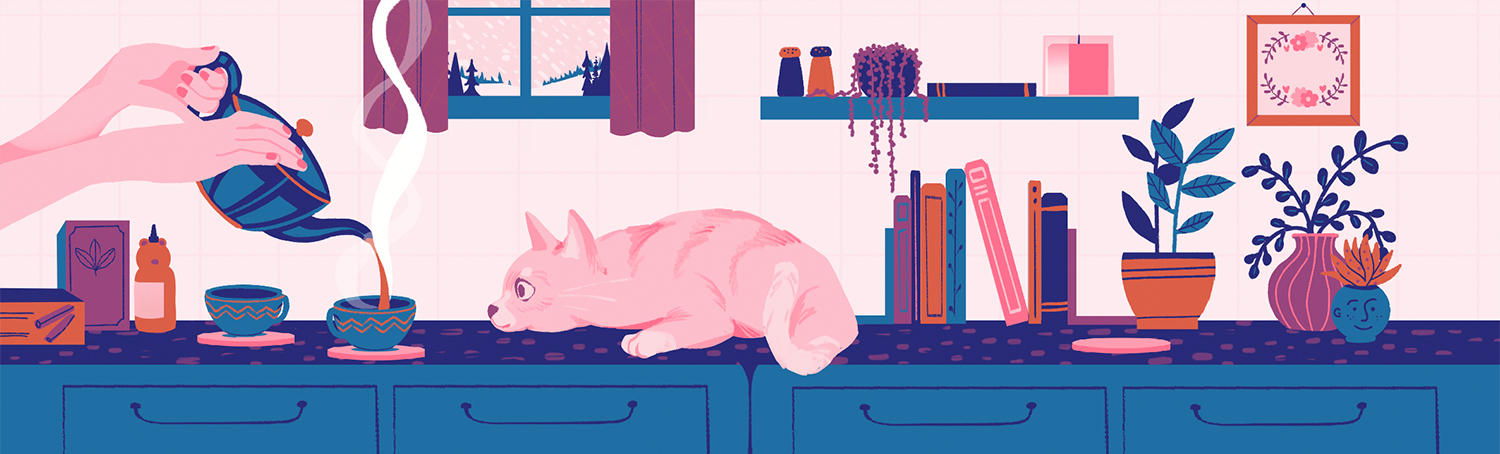 kitchen table with cat and tea on it